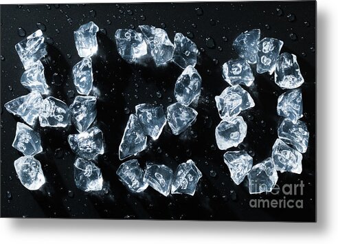 H2o Metal Print featuring the photograph H2O water symbol written in ice cubes and melting by Simon Bratt