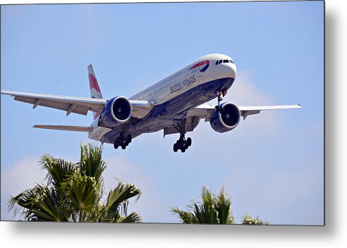 Boeing 777 Metal Print featuring the photograph Skimming Palm Trees by Fraida Gutovich