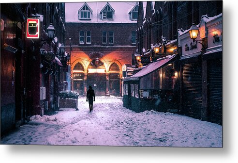 Arcade Metal Print featuring the photograph Walking in the snow - Dublin, Ireland - Color street photography by Giuseppe Milo