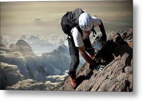 Sports Helmet Metal Print featuring the photograph Climber On The Mount Rosa Massif by Buena Vista Images