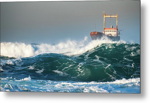 Shipwreck Metal Print featuring the photograph Abandoned ship in the stormy ocean by Michalakis Ppalis