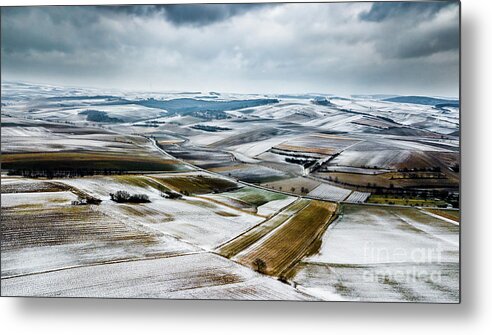 Above Metal Print featuring the photograph Aerial View Of Winter Landscape With Remote Settlements And Snow Covered Fields In Austria by Andreas Berthold