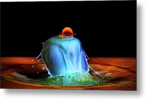 Water Drop Collision Metal Print featuring the photograph Red Moon Over a Waterfall by Michael McKenney
