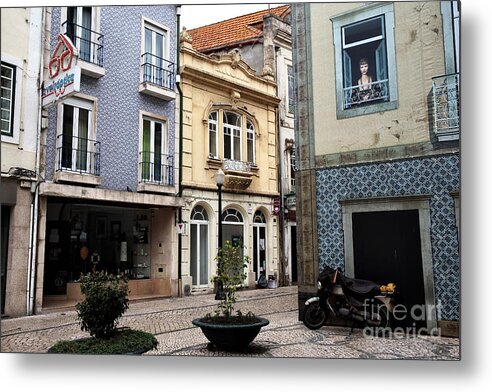 Plaza In Aveiro Metal Print featuring the photograph Plaza in Aveiro by John Rizzuto