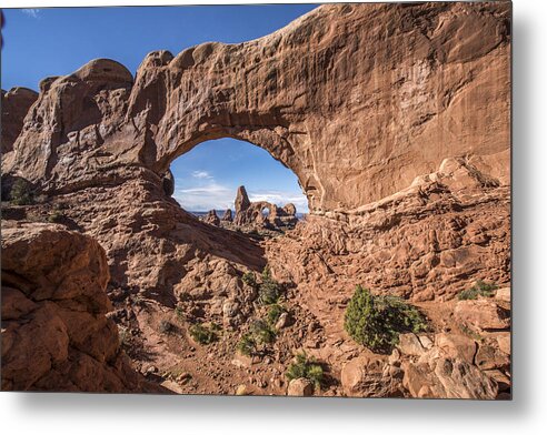 Arches Metal Print featuring the photograph A Window to More by Jon Glaser