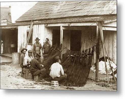 Fishermen Metal Print featuring the photograph Fishermen repairing nets Santa Cruz Circa 1907 by Monterey County Historical Society