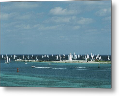Motorboat Metal Print featuring the photograph Nassau Sailing by Slim Aarons
