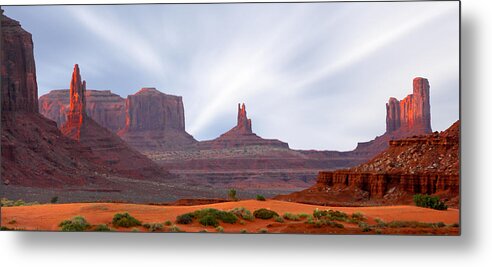 Desert Metal Print featuring the photograph Monument Valley at Sunset Panoramic by Mike McGlothlen
