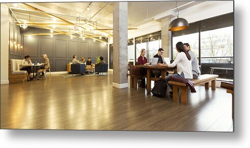 New Business Metal Print featuring the photograph Creative business people working in modern creative office by Compassionate Eye Foundation/Steven Errico