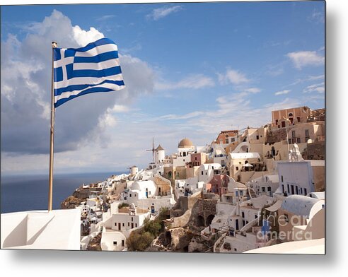 Greece Metal Print featuring the photograph Greek national flag waving over Oia - Santorini - Gr by Matteo Colombo