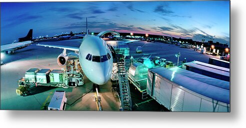 Freight Transportation Metal Print featuring the photograph Cargo Plane Being Loaded At Night by Greg Pease