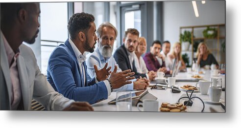 Expertise Metal Print featuring the photograph Executive Team Listening to Contrary Views from Colleague by AzmanL