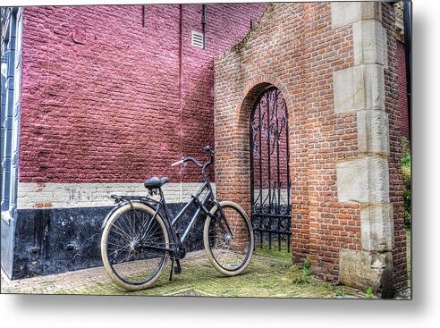 Holland Metal Print featuring the photograph The Gate by Uri Baruch