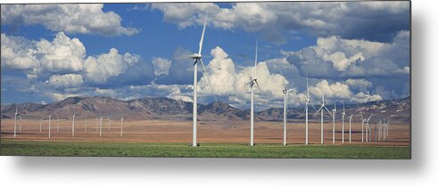 Tranquility Metal Print featuring the photograph Field Of Wind Generators, Mountains And by Timothy Hearsum