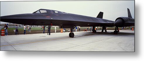 Photography Metal Print featuring the photograph Lockheed Sr-71 Blackbird On A Runway by Panoramic Images