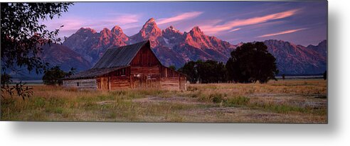 Scenics Metal Print featuring the photograph Weathered Wooden Barn With Mountains by Travelpix Ltd