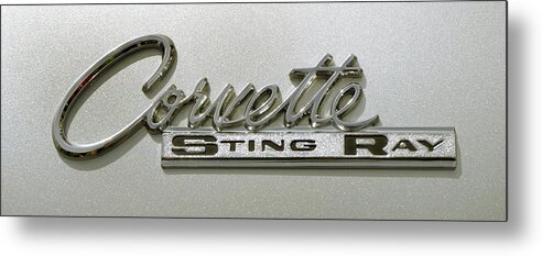 Corvette Stingray Metal Print featuring the photograph Corvette Stingray Emblem by Mike McGlothlen