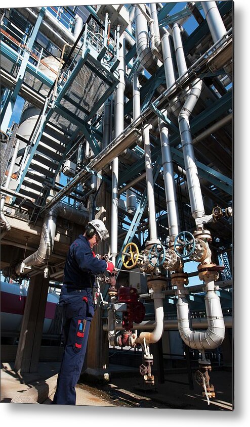 Day Metal Print featuring the photograph Worker Checking Pipework On An Oil And Gas Refinery #1 by Christian Lagerek/science Photo Library