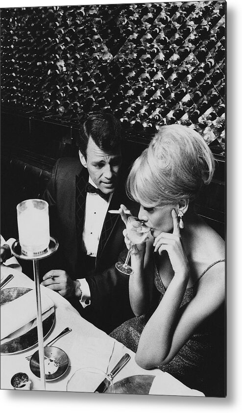 #faatoppicks Metal Print featuring the photograph A Glamorous 1960s Couple Dining by Horn & Griner