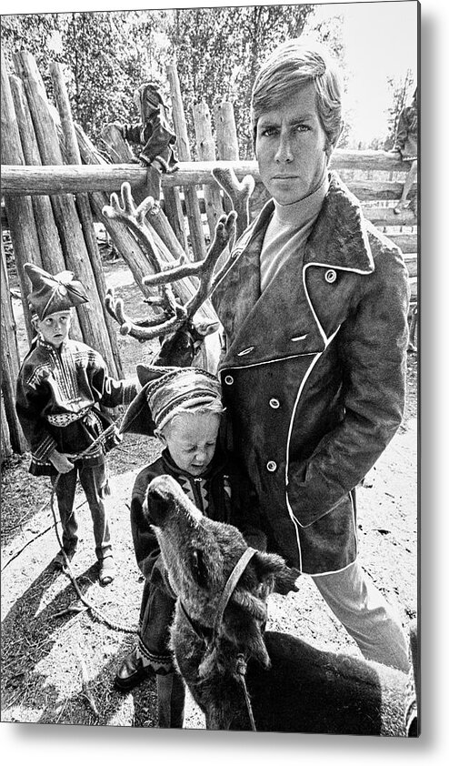 Fashion Metal Print featuring the photograph A Male Model Wearing A Coat Posing With Children by Leonard Nones