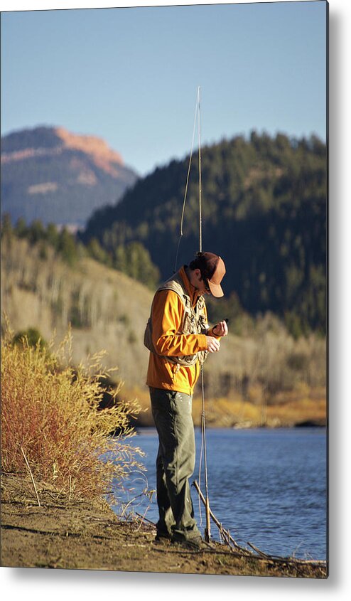 Adult Metal Print featuring the photograph A Man Prepares A Fly On The Gros Ventre by Derek DiLuzio