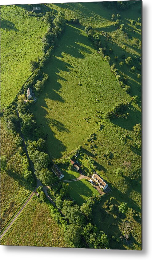 Scenics Metal Print featuring the photograph Aerial View Over Farmhouse Livestock by Fotovoyager