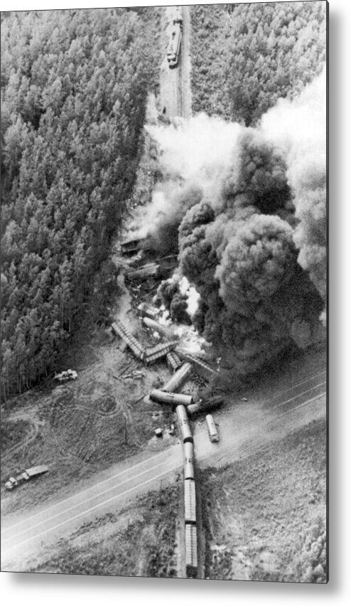 1970's Metal Print featuring the photograph Alaskan Train Wreck by Underwood Archives