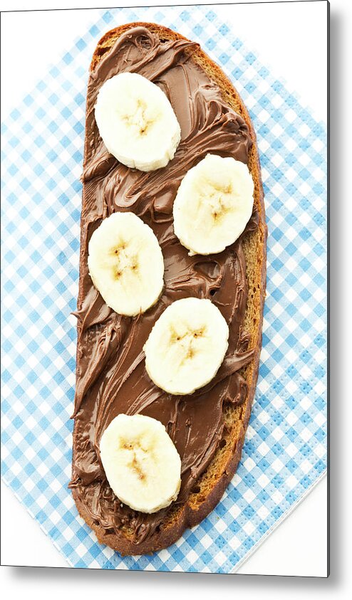 White Background Metal Print featuring the photograph Bread Topped With Nutella And Banana by Westend61