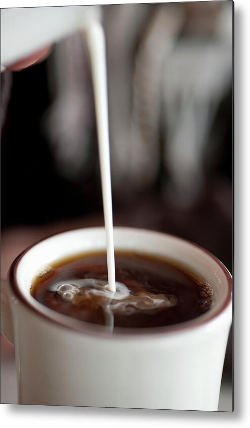 Inspiration Metal Print featuring the photograph Cream Being Poured Into Cup Of Coffee by David Mcglynn