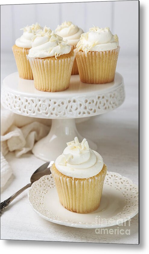 Vanilla Metal Print featuring the photograph Cupcakes decorated with icing and white chocolate by Sandra Cunningham