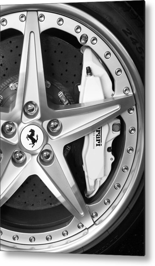 Ferrari Wheel Emblem Metal Print featuring the photograph Ferrari Wheel Emblem by Jill Reger