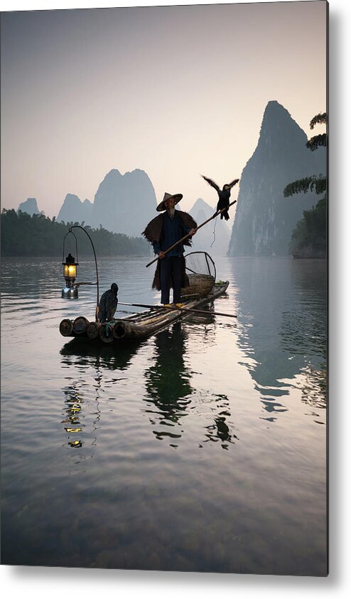 Chinese Culture Metal Print featuring the photograph Fisherman With Cormorants On Li River by Matteo Colombo
