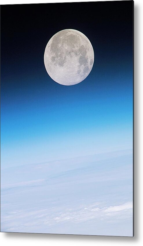 Moon Metal Print featuring the photograph Full Moon Above Earth by Nasa/science Photo Library
