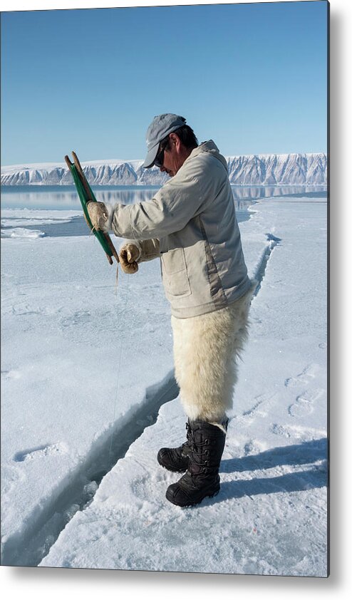 Human Metal Print featuring the photograph Inuit Hunter Line Fishing by Louise Murray