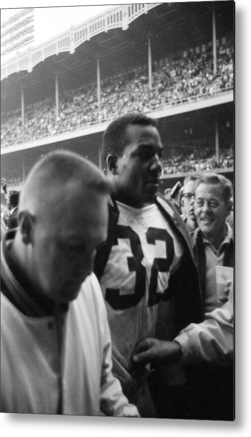 Marvin Newman Metal Print featuring the photograph Jim Brown After Game Fans Clapping by Retro Images Archive