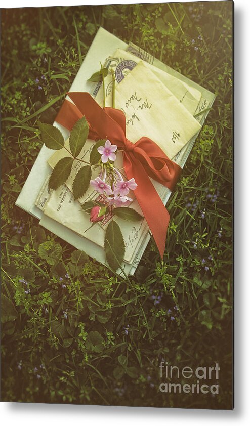 Atmosphere Metal Print featuring the photograph Letters with red satin ribbon in the grass by Sandra Cunningham