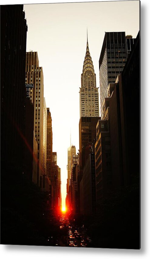 New York City Metal Print featuring the photograph Manhattanhenge Sunset and the Chrysler Building by Vivienne Gucwa