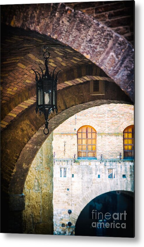 Ancient Metal Print featuring the photograph Medieval arches with lamp by Silvia Ganora