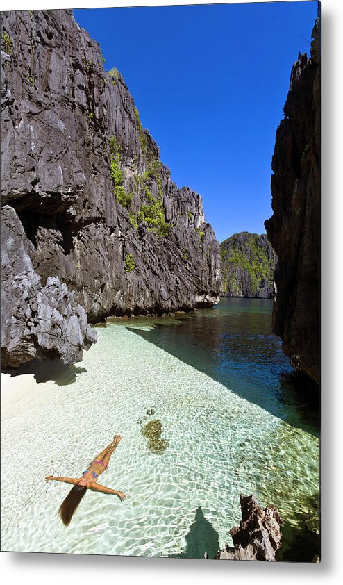 Scenics Metal Print featuring the photograph Palawan Province, El Nido, Woman by John Seaton Callahan