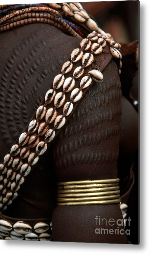 Vertical Metal Print featuring the photograph Person Showing Cowry Shell Detail by Art Wolfe