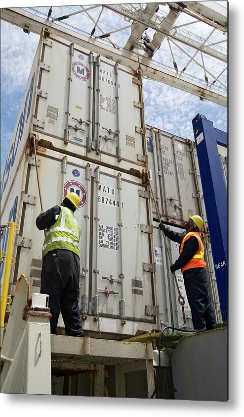 Human Metal Print featuring the photograph Port Workers Handling Cargo Containers by Jim West