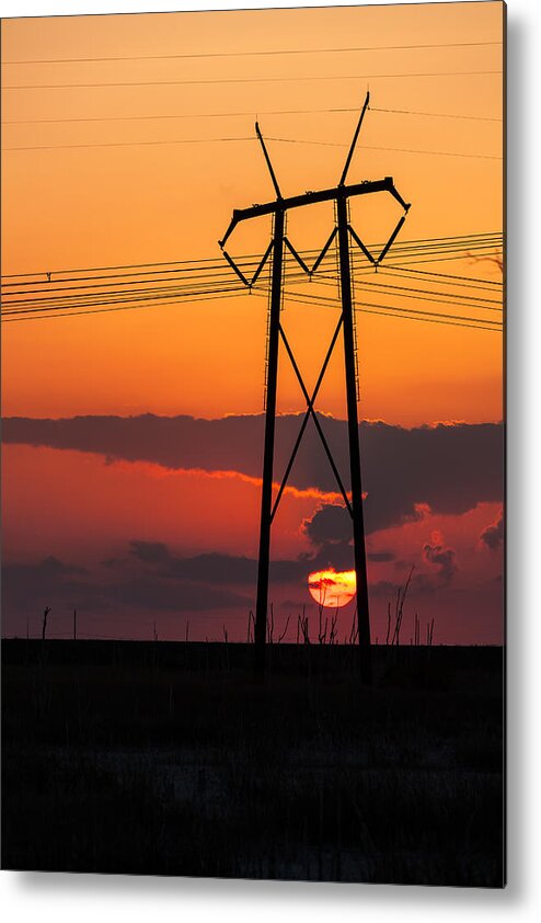 Power Tower Metal Print featuring the photograph Power Tower With Setting Sun by Ed Gleichman