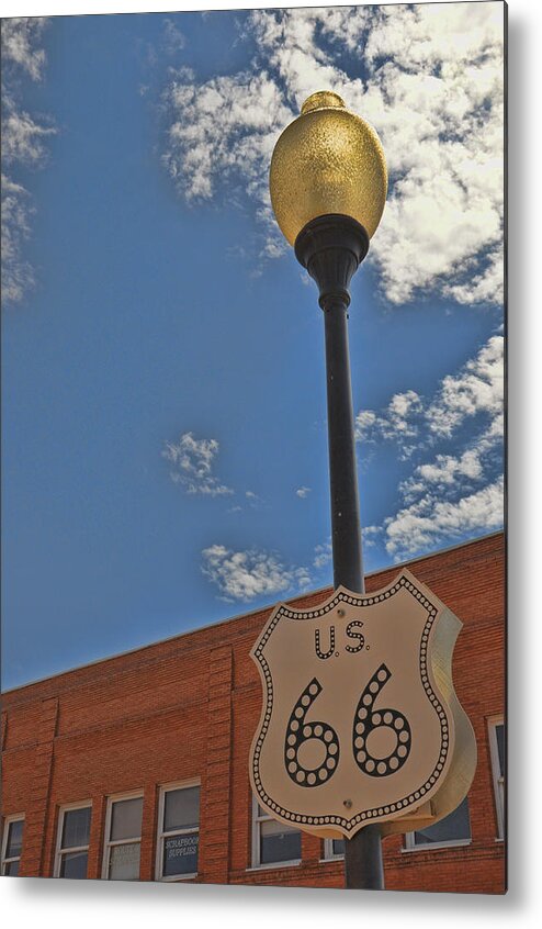 Winslow Arizona Metal Print featuring the photograph Route 66 Light Post by Jeanne May