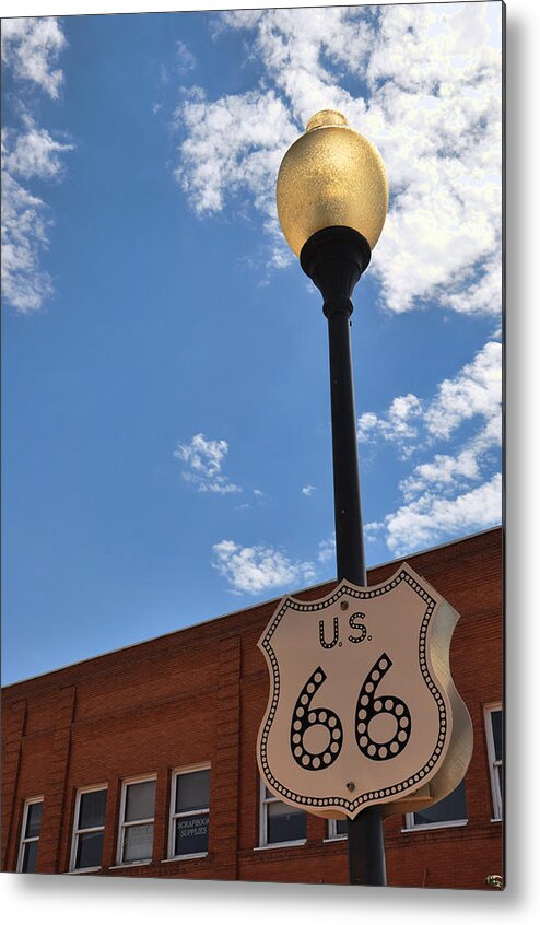 Winslow Arizona Metal Print featuring the photograph Route 66 Light post vivid by Jeanne May