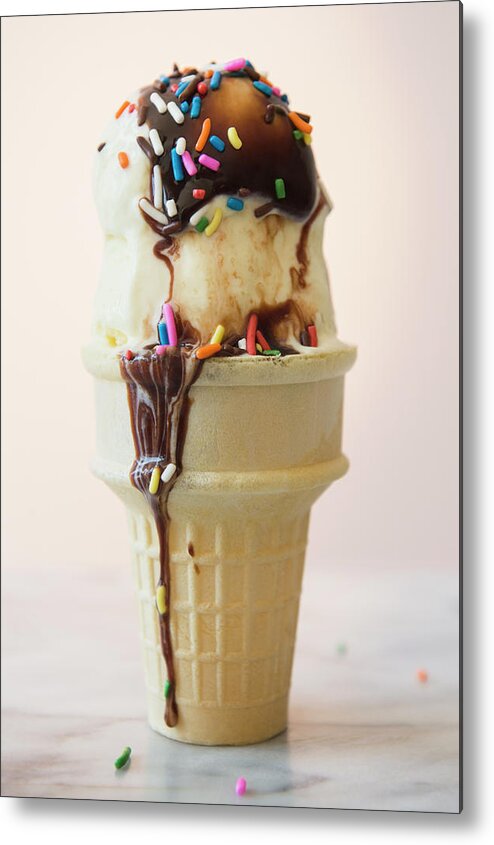 Melting Metal Print featuring the photograph Studio Shot Of Ice Cream Cone With by Jamie Grill