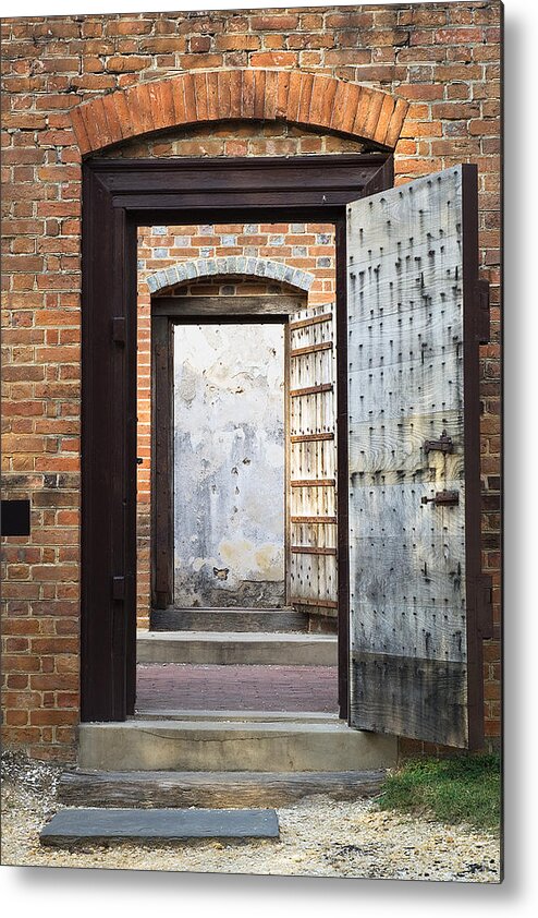 Jail Metal Print featuring the photograph These Doors Lead to Nowhere by Jeff Abrahamson