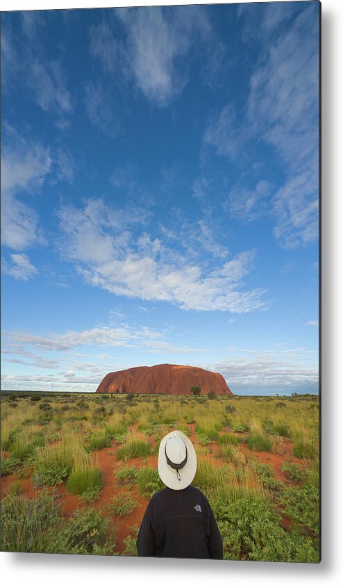 00477467 Metal Print featuring the photograph Tourist And Clouds At Ayers Rock by Yva Momatiuk John Eastcott