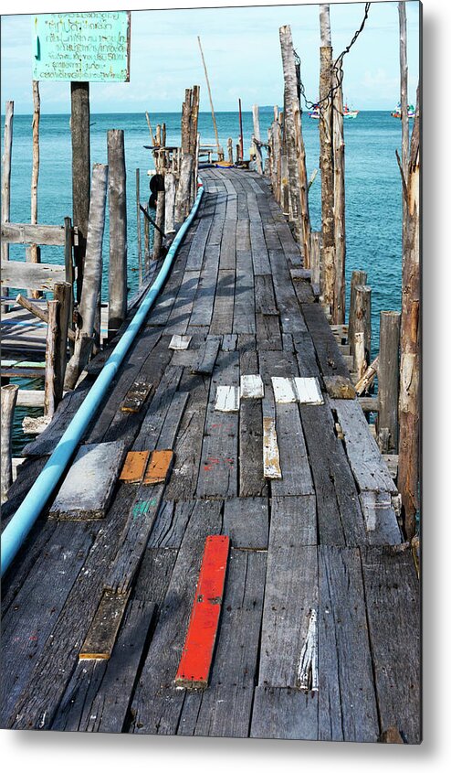 Wooden Post Metal Print featuring the photograph Wooden Footbridge Over Ocean by Sami Sarkis