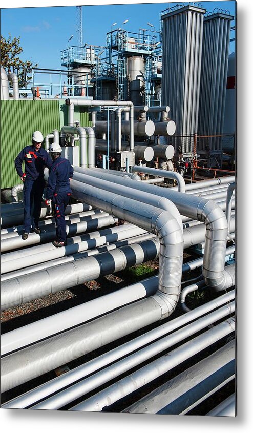 Day Metal Print featuring the photograph Workers Checking Pipework On An Oil And Gas Refinery by Christian Lagerek/science Photo Library