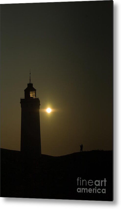 Lighthouse By Sunset Metal Print featuring the photograph Lighthouse by Jorgen Norgaard
